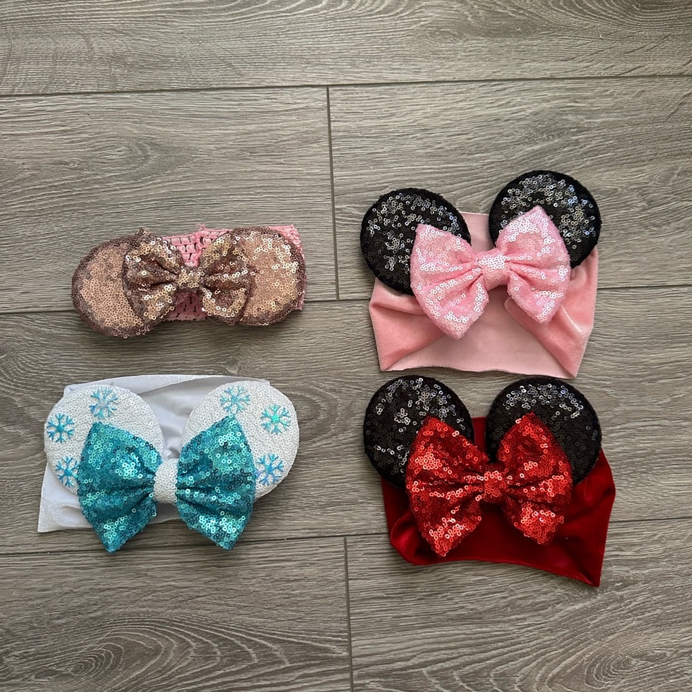 Set of Infant Mickey Ear headbands.